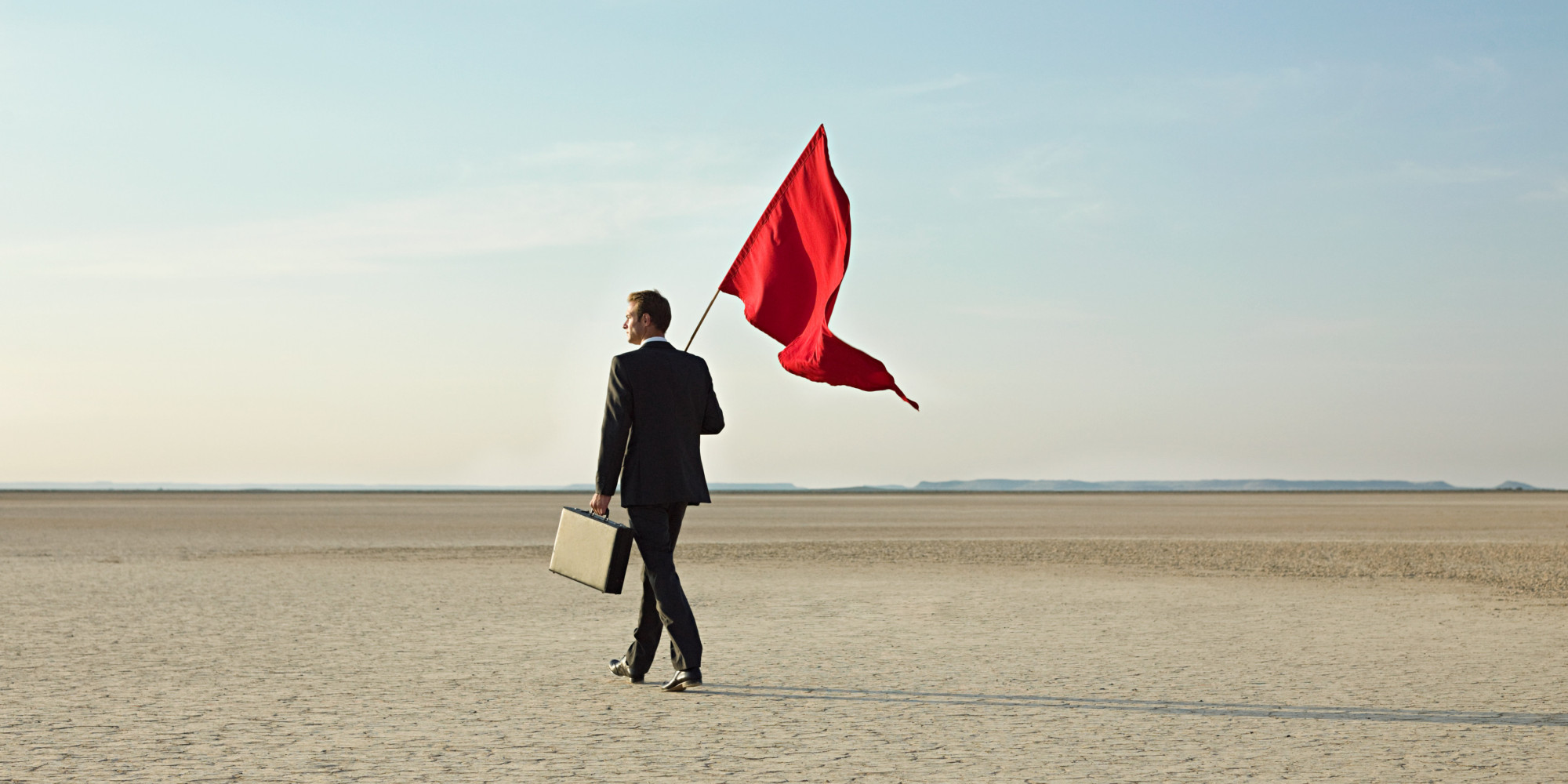 O MAN HOLDING RED FLAG Facebook 