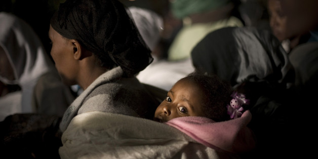 Members of the Falash Mura, Ethiopians who returned to Judaism after their ancestors converted to Christianity to escape persecution at the end of the 19th century, arrive at Ben Gurion airport in Tel Aviv, Israel, early Tuesday, Jan. 19, 2010. The first group of immigrants in over a year arrived to Israel early Tuesday on a flight organized by the Jewish Agency for Israel. (AP Photo/Bernat Armangue)