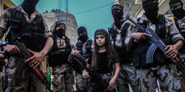 Children taking part in the military parade, which was organized by Al-Quds Brigades, the armed wing of Islamic Jihad, marking the end of the war on Gaza and what they called a victory over Israel. Gaza, Palestine, on August 29, 2014. Photo by Ibrahim Khader/Pacific Press/ABACAPRESS.COM