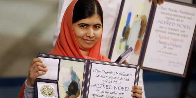 Nobel Peace Prize winners Malala Yousafzai from Pakistan, front, and Kailash Satyarthi of India are awarded their Nobel Peace Prize during the Nobel Peace Prize award ceremony in Oslo, Norway, Wednesday, Dec. 10, 2014. The Nobel Peace Prize is being shared between Malala Yousafzai, the 17-year-old Taliban attack survivor, and the youngest Nobel Prize winner ever, and Indian children's rights activist Kailash Satyarthi in a ceremony in Oslo on Wednesday. (AP Photo/Matt Dunham)