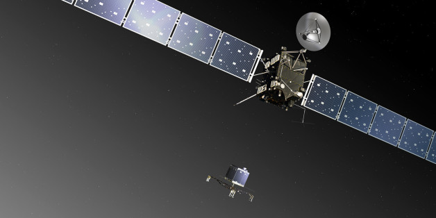 FILE - This image provided by the European Space Agency ESA shows an artistâs impression of the Rosetta orbiter deploying the Philae lander to comet 67P/ChuryumovâGerasimenko. The image is not to scale; the Rosetta spacecraft measures 32 m across including the solar arrays, while the comet nucleus is thought to be about 4 km wide. Scientists at the European Space Agency are expecting their comet-chasing probe Rosetta to wake from almost three years of hibernation at 11 a.m. Monday Jan. 20, 2014 (1000 GMT; 5 a.m. EST) and phone home to say all is well. (AP Photo/ESA, C.Carreau, File)