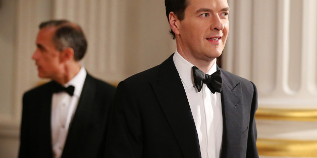 Chancellor of the Exchequer George Osborne is followed by Mark Carney, Governor of the Bank of England, as they enter the Lord Mayor's Dinner to the Bankers and Merchants of the City of London at Mansion House, central London.