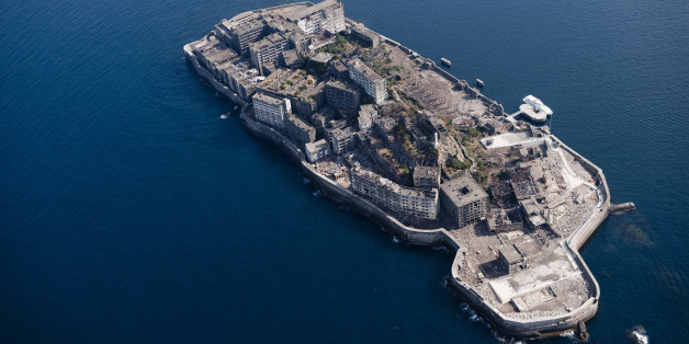 Japan, Nagasaki Prefecture, Kyushu, Nagasaki, Aerial view of Warship island . (Photo by: JTB Photo/UIG via Getty Images)
