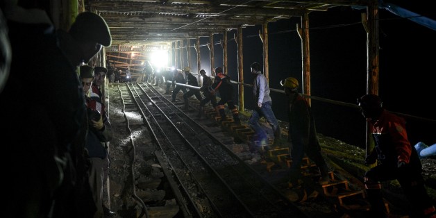 KARAMAN, TURKEY - OCTOBER 28: Search and rescue team work to save miners trapped inside a coal mine flooded with water in Ermenek district of Karaman, southeastern Turkey on October 28, 2014. At least 18 workers have been trapped underground after an accident at a coal mine in the Ermenek town in Karaman province, around 400 kilometers south of the capital Ankara. (Photo by Murat Kula/Anadolu Agency/Getty Images)