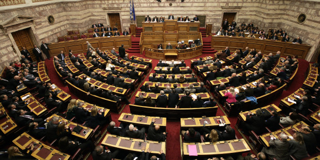 ATHENS, GREECE , DECEMBER 17: Lawmakers preside over the first round of voting to elect a new Greek president at the Parliament on December 17, 2014 in Athens, Greece. Mihaloliakos and Papas The Greek parliament has failed to elect a new president after the first of three rounds of voting. The government's candidate, Stavros Dimas got 160 votes - 40 short of an outright win. If he fails to get elected after the next two rounds there will be a general election. (Photo by Milos Bicanski/Getty Images)
