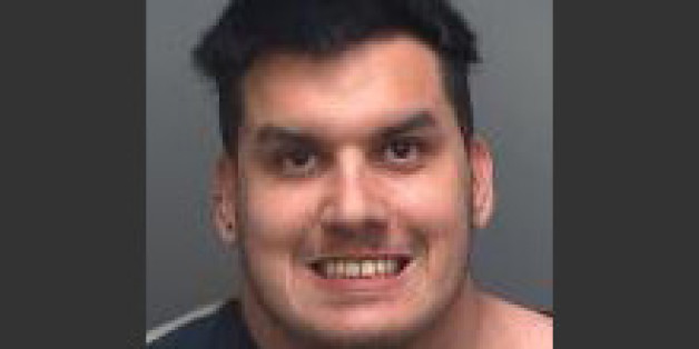 This undated photo provided by the Pinellas County Sheriff's office shows Christian Jose Gomez who was charged with first-degree murder after his mother was found decapitated outside their home on New Year's Eve. According to the Pinellas County Sheriff's Office, Mario Gomez called 911 on Wednesday, Dec. 31, 2014, and told dispatchers that his brother Christian had killed their mother and cut off her head. (AP Photo/Pinellas County Sheriff's Office)