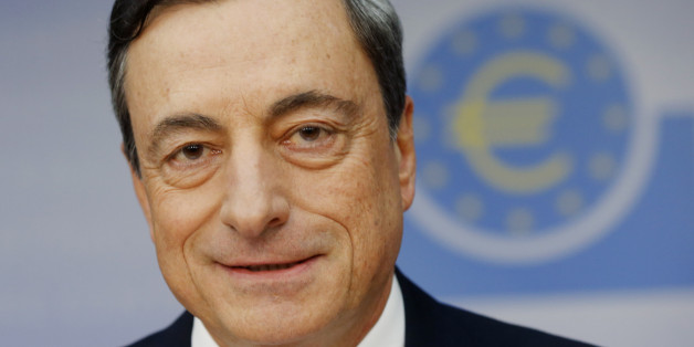 President of European Central Bank Mario Draghi, attends a news conference in Frankfurt, Germany, Thursday, Nov. 6, 2014, following a meeting of the ECB governing council. European Central Bank head Mario Draghi opened the door for further stimulus saying the bank staff is preparing the technical groundwork for further support measures if needed for the struggling economy. Stocks rallied and the euro slumped on the news. The ECB did not announce further monetary support after its governing cou