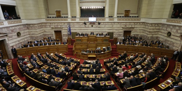 Greek lawmakers attend the third round of voting to elect a new Greek president at the Parliament in Athens on Monday, Dec. 29, 2014, as Greece heads to early general elections after parliament failed to elect a new president in a third and final round of voting. The coalition governmentâs candidate for the post, the 73-year-old former European commissioner Stavros Dimas, garnered 168 votes from parliamentâs 300 seats, short of the 180 votes needed to win. (AP Photo/Thanassis Stavrakis