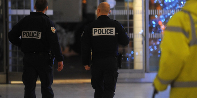 PARIS, FRANCE - JANUARY 08: Police officers patrol the Gare du Nord railway station on January 8, 2015 in Paris, France. France's Vigipirate terrorist security plan is at it's maximum level in the country after twelve people were killed, including two police officers, at the offices of the French satirical publication Charlie Hebdo. (Photo by Antoine Antoniol/Getty Images)