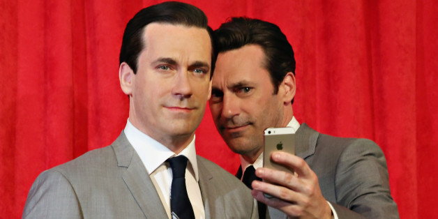 NEW YORK, NY - MAY 09: Actor Jon Hamm takes a selfie as he unveils Don Draper's wax figure during Mad Men's Final Season at Madame Tussauds New York on May 9, 2014 in New York City. (Photo by Cindy Ord/Getty Images for Madame Tussauds)