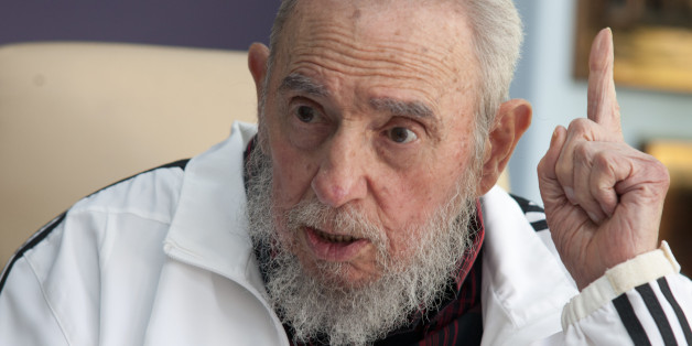 FILE - In this July 11, 2014 file photo, Cuba's Fidel Castro speaks with Russia's President Vladimir Putin in Havana, Cuba. In a statement published Friday, July 18, 2014 by state media, Castro is blaming the Ukrainian government in Kiev for the downing of a Malaysian Airlines passenger plane. Castro's comments came one week after he welcomed Vladimir Putin during the Russian leader's tour of Latin America. (AP Photo/Alex Castro, File)