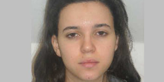FILE - This photo provided by the Paris Police Prefecture Friday, Jan. 9, 2015 shows Hayat Boumedienne the suspect in the kosher market attack. Turkey's foreign minister said Monday Jan.12, 2015 that Boumedienne, wife of Amedy Coulibaly, one of the perpetrators of the terrorist rampage in France last week, crossed into Syria from Turkey on Jan. 8. (AP Photo/Prefecture de Police de Paris, File)