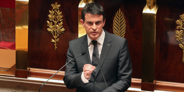 French prime minister Manuel Valls delivers his speech during an homage to the 17 victims of last week terrorist attacks, at the French national Assembly in Paris, Tuesday Jan. 13, 2015. (AP Photo/Remy de la Mauviniere)