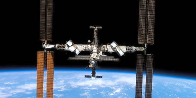 Backdropped by the blackness of space and Earth's horizon, the International Space Station and Space Shuttle Atlantis move farther apart at the end of STS-117's mission, during which the shuttle and station crews concluded about eight days of cooperative work. Undocking of the two spacecraft occurred at 10:42 a.m. EDT on June 19, 2007. STS-117 pilot Lee Archambault was at the controls for the departure and fly-around, which gave Atlantis' crew a look at the station's newly expanded configuration.
Source: NASA
<a href="http://www.nasa.gov/multimedia/imagegallery/image_feature_852.html">www.nasa.gov/multimedia/imagegallery/image_feature_852.html</a>