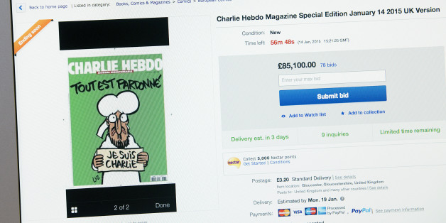 LONDON, UNSPECIFIED - JANUARY 14: The first edition of Charlie Hebdo magazine since last weeks attack on the magazines office in Paris is pictured on sale on eBay on January 14, 2015 in London, England. The magazine, featuring a picture of the Prophet Muhammad on its cover, is yet to go on sale in newsagents in the UK but is already being sold online where it is fetching hundreds of pounds. (Photo by Carl Court/Getty Images)
