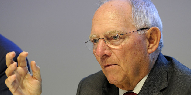German Finance Minister Wolfgang Schauble speaks during a news conference in Milan, Italy, Saturday, Sept. 13, 2014. European finance ministers are discussing proposals for leveraging private investments to relaunch the continent's moribund economy. European ministers are holding their first meeting since European Central Bank chief Mario Draghi outlined a three-pillared strategy to save the eurozone economy. Saturday's session was focusing on a proposal for 300 billion euros ($388 billion) in investments to revive the economy. (AP Photo/Giuseppe Aresu)