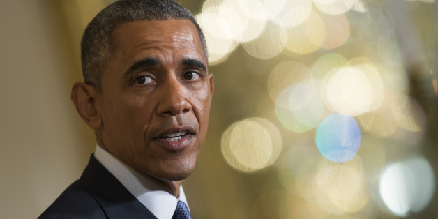 President Barack Obama speaks during a joint news conference with British Prime Minister David Cameron in the East Room of the White House in Washington, Friday, Jan. 16, 2015. In a show of trans-Atlantic unity, President Barack Obama and British Prime Minister David Cameron pledged a joint effort on Friday to fight domestic terrorism following deadly attacks in France. They also strongly urged the U.S. Congress to hold off on implementing new sanctions on Iran in the midst of nuclear talks. (AP Photo/Evan Vucci)