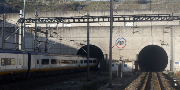 A Eurostar train heading to London enters the Channel tunnel to England in Coquelles, northern France, Wednesday Dec. 10, 2008. Jacques Gounon, Eurotunnel's Chairman and Chief Executive officer announced that the tunnel could fully reopen for commercial operations mid February 2009. A blaze on Sept. 11, 2008 in the Channel Tunnel, linking Britain to to continental Europe, halted traffic and caused chaos for travelers and freight. (AP Photo/Michel Spingler)