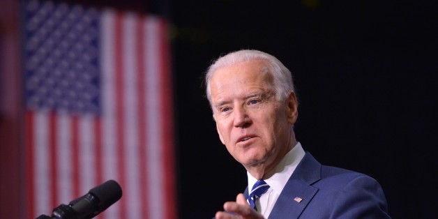 US Vice President Joe Biden speaks as he introduces US President Barack Obama at Pellissippi State Community College in Knoxville, Tennessee on January 9, 2015. AFP PHOTO/MANDEL NGAN (Photo credit should read MANDEL NGAN/AFP/Getty Images)