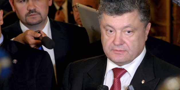 MILAN, ITALY - OCTOBER 17: Prime Minister of Ukraine Petro Oleksijovyc Porosenko speaks with the media at the end of the bilateral meeting with the Russian President Vladimir Putin, at the Westin Hotel, on the sidelines of the10 ASEM Summit with 50 Heads Of State From Europe And Asia on October 17, 2014 in Milan, Italy.The Asia-Europe Meeting (ASEM) was initiated in 1996 when the ASEM leaders met in Bangkok, Thailand. ASEM is an informal trans-regional platform for dialogue and cooperation be