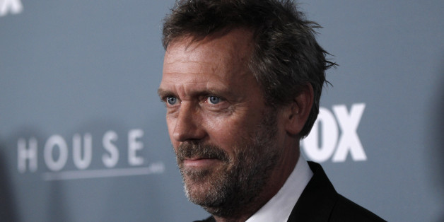 Cast member Hugh Laurie arrives at the "House" series finale wrap party Los Angeles, Friday, April 20, 2012. (AP Photo/Matt Sayles)