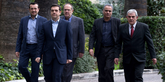 ATHENS, GREECE - JANUARY 26: Syriza party leader Alexis Tsipras (2nd left) leaves after being sworn in by Greek President Karolos Papoulias as Greece's new Prime Minister at the Presidential Palace on January 26, 2015 in Athens, Greece. Alexis Tsipras was sworn in with a secular oath, rather than the traditional Greek Orthodox ceremony, becoming the youngest man to hold the post of Prime Minister in 150 years. The radical left party Syriza won the snap Greek general election and has asked the r