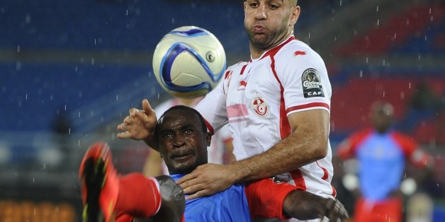 BATA, EQUATORIAL GUINEA - JANUARY 26: Tunisia's Aymen Abdennour (R) in action against Congo's Firmin Mubele Ndombee (L) during the 2015 African Cup of Nations Group B soccer match between Gabon and Congo at Bata Stadium in Bata, Equatorial Guinea on January 26, 2015. (Photo by Mohamed Hossam/Anadolu Agency/Getty Images)