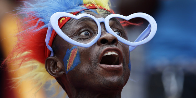 A Democratic Republic of Congo soccer fan reacts during the African Cup of Nations quarter final soccer match between Congo and DR Congo in Bata, Equatorial Guinea, Saturday, Jan. 31, 2015. (AP Photo/Themba Hadebe)