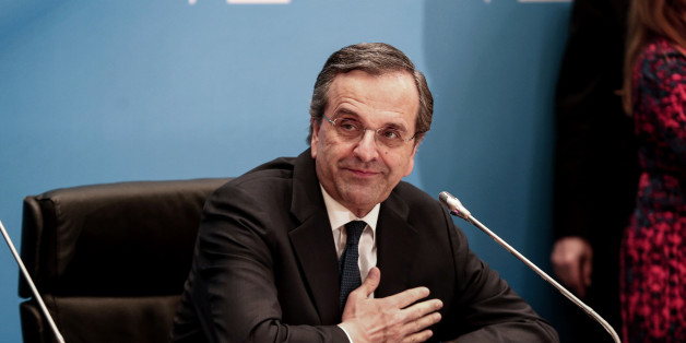 Antonis Samaras, Greece's prime minister, acknowledges his supporters as he makes statements at Zappeion hall in Athens, Greece, on Sunday, Jan. 25, 2015. Greek voters go to the polls today in a general election that will decide whether Europe's most-indebted country sticks to the economic-overhaul program set out by its troika of official creditors or tries to chart its own course. Photographer: Yorgos Karahalis/Bloomberg via Getty Images