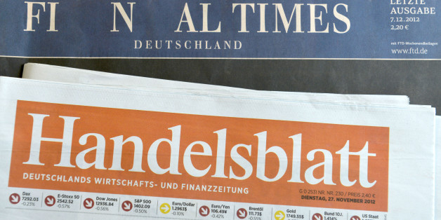 HAMBURG, GERMANY - DECEMBER 07: The final issue of the Financial Times Deutschland daily newspaper is seen on a issue of the Handelsblatt, its biggest competitioner, on December 7, 2012 in Hamburg, Germany. Gruner + Jahr launched the paper in 2000 and its management recently decided to cease publication given that the paper had failed every year to make a profit. Germany has been hit by several media bankruptcies in recent months, including the Frankfurter Rundschau daily newspaper and the DAPD news agency. (Photo by Patrick Lux/Getty Images)
