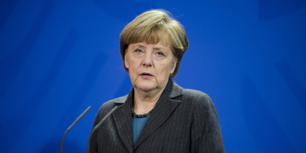 German Chancellor Angela Merkel addresses the media during a joint press conference as part of a meeting with Prime Minister of Singapore Lee Hsien Loong at the chancellery in Berlin, Germany, Tuesday, Feb. 3, 2015. (AP Photo/Steffi Loos)