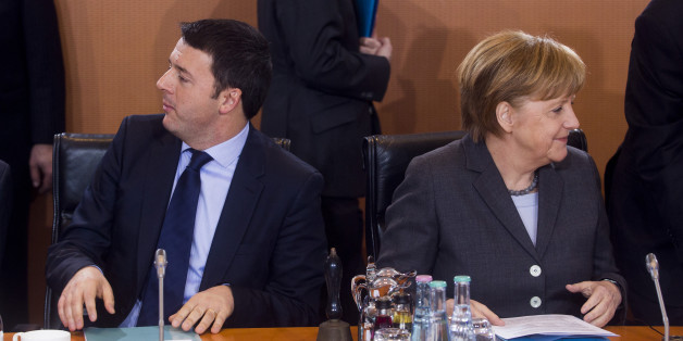 BERLIN, GERMANY - MARCH 17: German Chancellor Angela Merkel (R) and Italian Prime Minister Matteo Rentzi pictured at the plenary meeting during German and Italian government consultations at the Chancellery on March 17, 2014 in Berlin, Germany. This is the first meeting of its kind between the two governments since Renzi took office in February. (Photo by Jochen Zick-Pool/Getty Images)