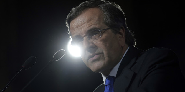 Greece's Prime Minister Antonis Samaras delivers his final campaign speech at the Taekwondo Indoor Stadium in southern Athens on Friday, Jan. 23, 2015. All opinion polls on Sunday's closely-watched national election agree: The radical left opposition Syriza party, which has vowed to rewrite the terms of Greece's international bailout, enjoys a lead of at least 4 percentage points over Prime Minister Antonis Samaras' conservatives. (AP Photo/Lefteris Pitarakis)