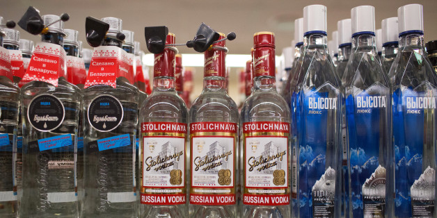 Bottles of Stolichnaya Russian vodka sit on a shelf inside a Dixy supermarket operated by OAO Dixy Group in Moscow, Russia, on Tuesday, April 8, 2014. Suppliers suffering from ruble depreciation this quarter are urging retailers to increase prices. Photographer: Andrey Rudakov/Bloomberg via Getty Images