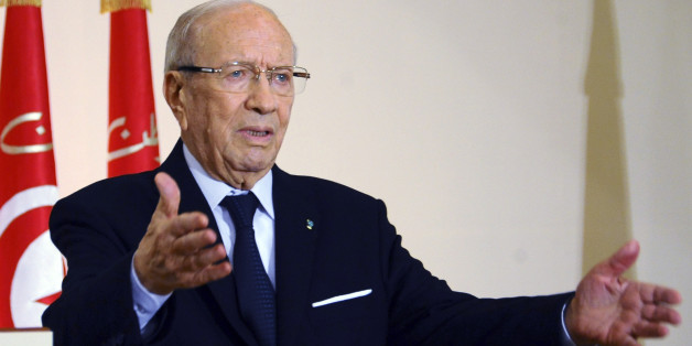 New Tunisia President, Beji Caid Essebsi gestures after delivering a speech to mark the fourth anniversary of the Tunisian revolution, Wednesday, Jan. 14, 2015. Four years ago, mass public protests ousted Tunisian President Zine el-Abidine Ben Ali from office. (AP Photo/Hassene Dridi)