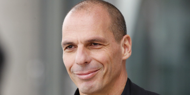 Greek Finance Minister Yanis Varoufakis leaves the European Central Bank after a meeting with the President of the ECB Mario Draghi in Frankfurt, Germany, Wednesday, Feb. 4, 2015. (AP Photo/Michael Probst)