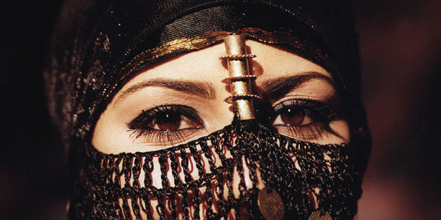 I didn't take this shot which was used in a local Vodafone campaign a few years back. This Arabian beauty from Sinai, Egypt is wearing a traditional bedouin head dress (that is covered with golden coins) to show her exotic eyes that are covered by an ancient dark makeup called "Kohl" originally used by the early Arabs and in ancient Egypt.