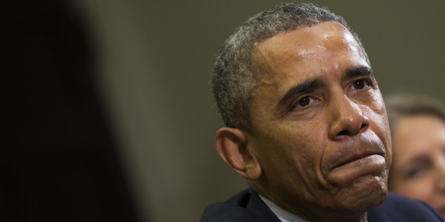 President Barack Obama pauses as he delivers remarks during a meeting with people that wrote him letters explaining how they benefited from the Affordable Care Act in the Roosevelt Room of the White House, on Tuesday, Feb. 3, 2015, in Washington. Obama also condemned the execution of Jordanian Air Force pilot First Lt. Moaz al-Kasasbeh by the Islamic State group. (AP Photo/Evan Vucci)