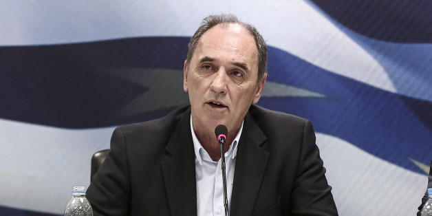 George Stathakis, Greece's incoming minister for economy, shipping, tourism and infrastructure, speaks during a handover ceremony in Athens, Greece, on Wednesday, Jan. 28, 2015. Varoufakis, is gearing up for negotiations with the euro area that have been on hold since December as Greece entered an election campaign. Photographer: Yorgos Karahalis/Bloomberg via Getty Images *** George Stathakis