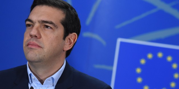 Greek Prime Minister Alexis Tsipras gives a press conference on February 4, 2015 after his meeting with the European parliament president at the European Parliament in Brussels. The euro held its gains on February 4 after a surge driven by growing optimism that Greece will hammer out a debt deal and avoid a possible default. AFP PHOTO / EMMANUEL DUNAND (Photo credit should read EMMANUEL DUNAND/AFP/Getty Images)