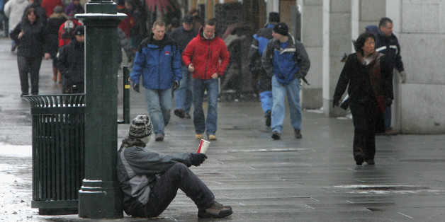 OSLO, NORWAY - FEBRUARY 25: A begger asks for money in central Oslo on February 25, 2007 in Oslo, Norway. (Photo by Chris Jackson/Getty Images)