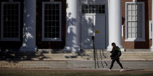 A student walks past Peabody Hall on the University of Virginia campus in Charlottesville, Virginia. (Photographer: Andrew Harrer/Bloomberg via Getty Images)