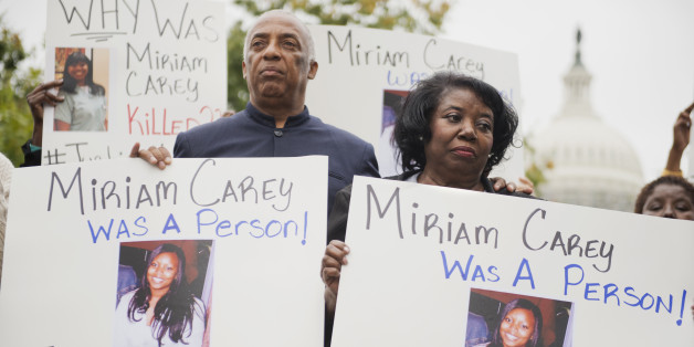 Idella Carey, mother of Miriam Carey who was killed last year by Capitol Police, and Charles Barron, protest Carey's death on the West Front of the Capitol, October 3, 2014. Carey was shot and killed by Capitol Police on October 3, 2013, after a high-speed chase. (Photo By Tom Williams/CQ Roll Call)