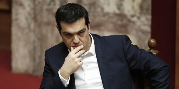 Alexis Tsipras, Greece's prime minister, sits and waits ahead of the swearing-in ceremony for the new government held at the Greek Parliament building in Athens, Greece, on Thursday, Feb. 5, 2015. Greece held fast to demands to roll back austerity as the European Central Bank turned up the heat before Finance Minister Yanis Varoufakis was to meet one of his main antagonists, German counterpart Wolfgang Schaeuble. Photographer: Yannis Behrakis/Pool via Bloomberg
