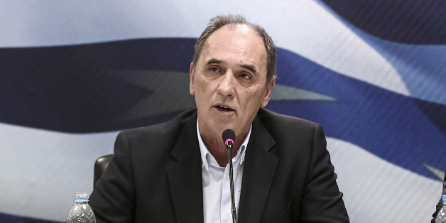 George Stathakis, Greece's incoming minister for economy, shipping, tourism and infrastructure, speaks during a handover ceremony in Athens, Greece, on Wednesday, Jan. 28, 2015. Varoufakis, is gearing up for negotiations with the euro area that have been on hold since December as Greece entered an election campaign. Photographer: Yorgos Karahalis/Bloomberg via Getty Images *** George Stathakis