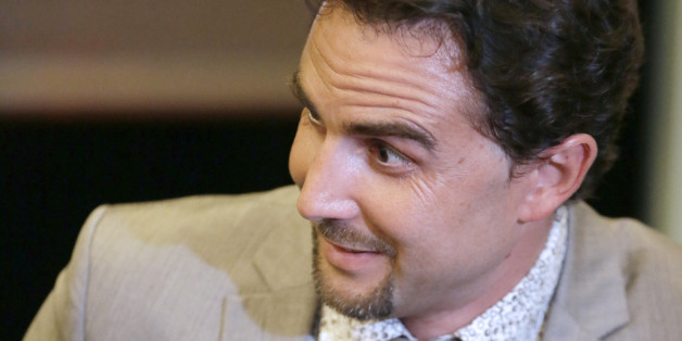 Former French employee of HSBC Private Bank Herve Falciani is seen on July 2, 2013 during his audition at the National Assembly, in Paris. Falciani was auditionned by socialist deputees Yann Galut and Sandrine Mazetier after being allowed to enter France and benefit from police protection and collaboration with justice. Falciani collected data on at least 24,000 customers of HSBC's Swiss subsidiaries from 2006 to 2008, while he worked in the bank's information technology development unit in Geneva, which he then passed on to French authorities. The data is at the centre of a row between France and Switzerland over suspicions of tax evasion by French citizens using Swiss bank accounts. AFP PHOTO / KENZO TRIBOUILLARD (Photo credit should read KENZO TRIBOUILLARD/AFP/Getty Images)