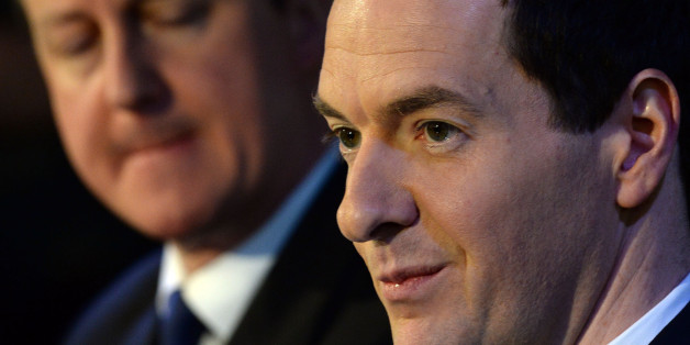 LEEDS, ENGLAND - FEBRUARY 05: Britain's Chancellor Of The Exchequer George Osborne (R) and Prime Minister David Cameron speak to business leaders at the AQL centre on February 5, 2015 in Leeds, England. The politicians are on a tour of Yorkshire to promote investment in the region. (Photo by Nigel Roddis/Getty Images)