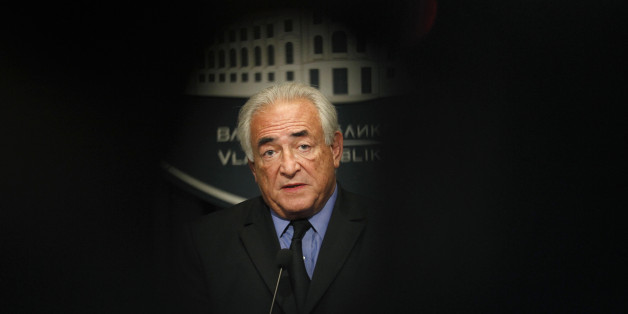 FILE - This Tuesday, Sept. 17, 2013, file photo shows former International Monetary Fund chief Dominique Strauss-Kahn, speaking during a press conference after his meeting with Serbia's deputy Prime Minister Aleksandar Vucic in Belgrade, Serbia. The former head of the International Monetary Fund, whose career nosedived amid accusations he sexually assaulted a hotel maid in New York, is facing Monday Feb.2, 2015 charges in France: aggravated pimping and involvement in a prostitution ring operating out of luxury hotels. (AP Photo/Darko Vojinovic, File)