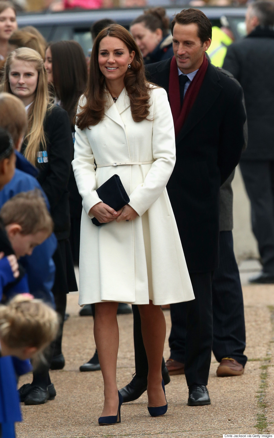 Kate Middleton's Belly Is In Full Bloom Under Chic White Coat