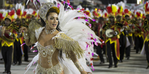 Drum Queen Carla Prata from the Academicos do Grande Rio samba school parade during carnival celebrations at the Sambadrome in Rio de Janeiro, Brazil, Tuesday, Feb. 12, 2013. (AP Photo/Felipe Dana)